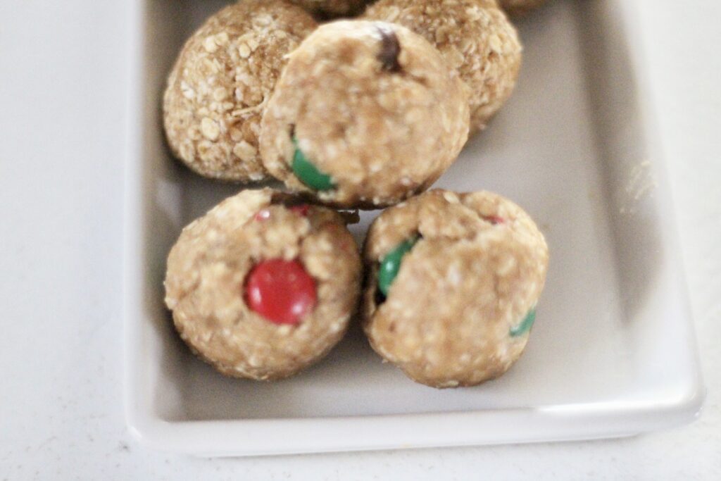 Oatmeal balls with MNM”s in them on tray