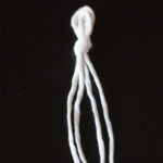 Overhand knot tied with macrame cord
