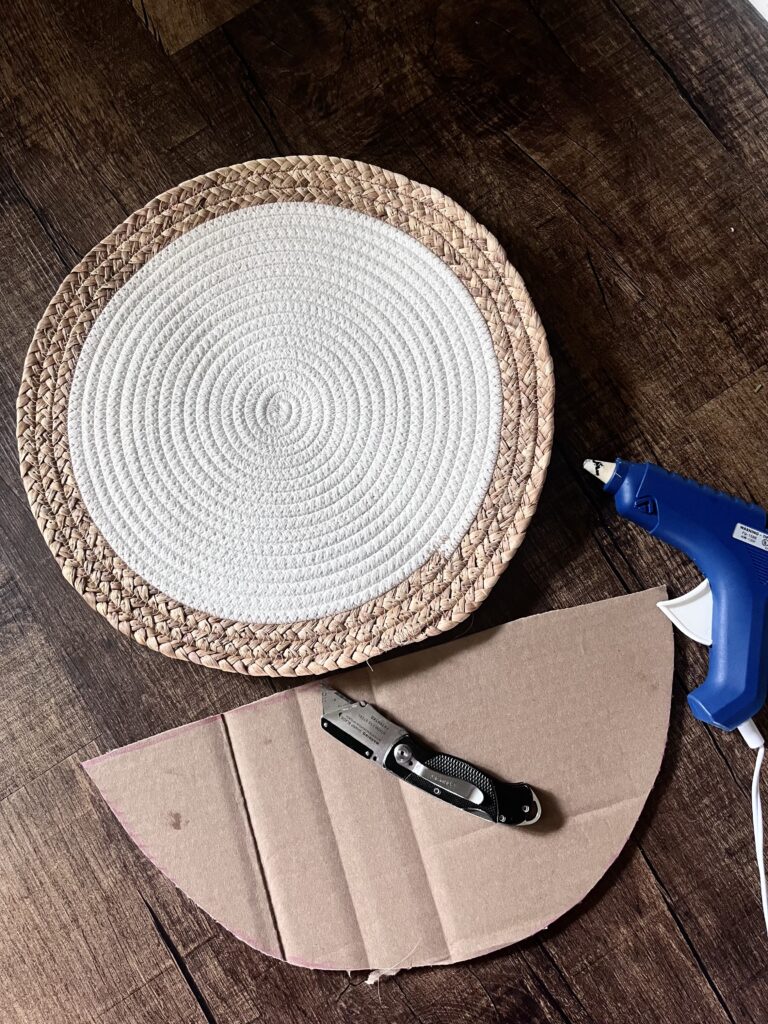 Placemat and cardboard with hot glue gun